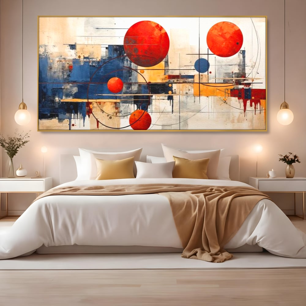 Tablou canvas cu pictura abstracta cu sfere rosii si orbite, in rama de aluminiu auriu, pe perete intr-un dormitor